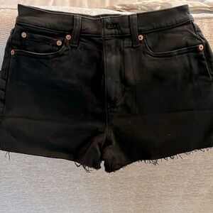 Black denim shorts